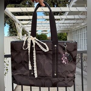 Black CoachTote Bag with Flower Charm